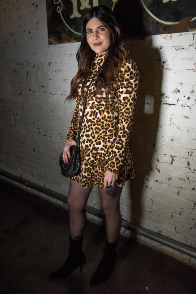 Who: Christie Vazquez, 33, Federal Hill resident, Brightside Boutique owner Spotted at: “A Holiday Disco” party hosted by Brightside Boutique What she wore: Leopard print skater dress with mock turtleneck from thereformation.com; black booties from stuartweitzman.com; and Givenchy black crossbody bag from Barneys New York. Using her fashion to spread the word: “Leopard is so in right now. I want to show the girls that it’s a serious trend right now.”