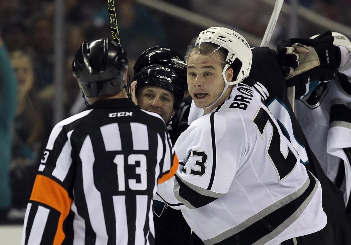 Kings captain Dustin Brown complains to referee Dan O'Halloran in the third period of Game 2 of the first-round playoff series against the Sharks on Sunday night at SAP Center in San Jose.