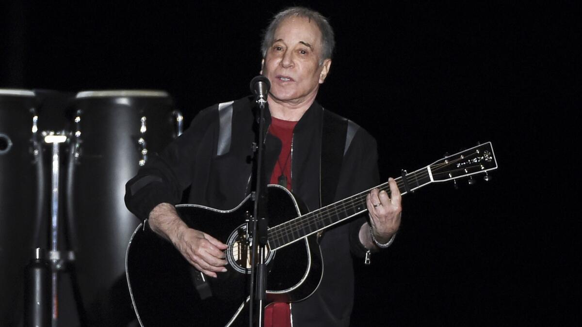 Paul Simon performs at Flushing Meadows Corona Park in New York last September.