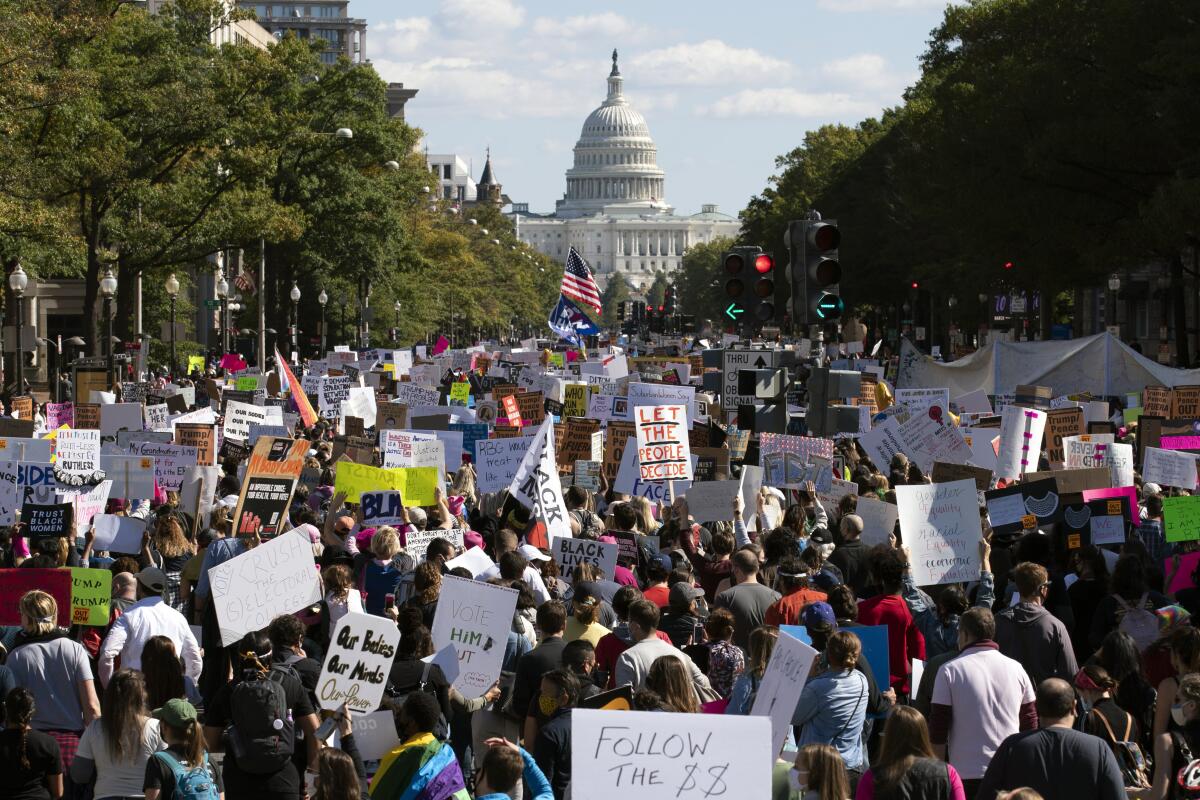 Pennsylvania Avenue is filled with demonstrators during the 2017 Women's March in Washington.
