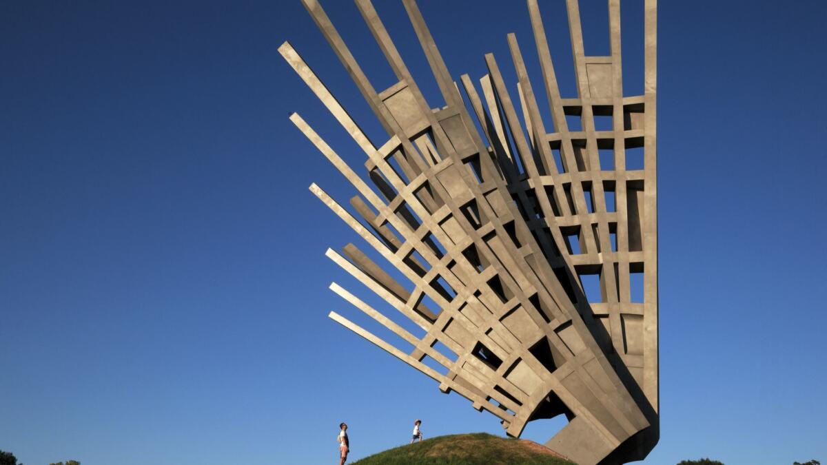 The Wings monument celebrates the memory of the anti-communist resistance in Bucharest, Romania. Austrian Airlines is offering a $681 round-trip fare.