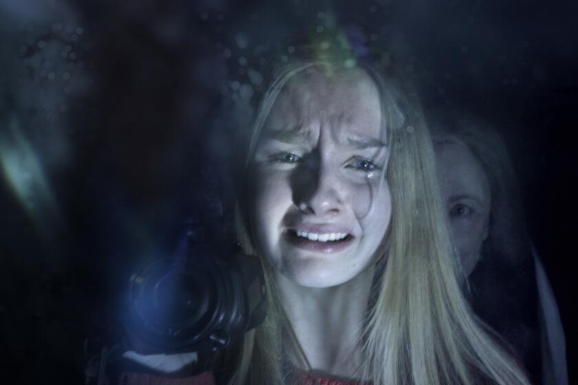 Olivia DeJonge, foreground, and Deanna Dunagan star in M. Night Shyamalan's hoped-for comeback "The Visit."