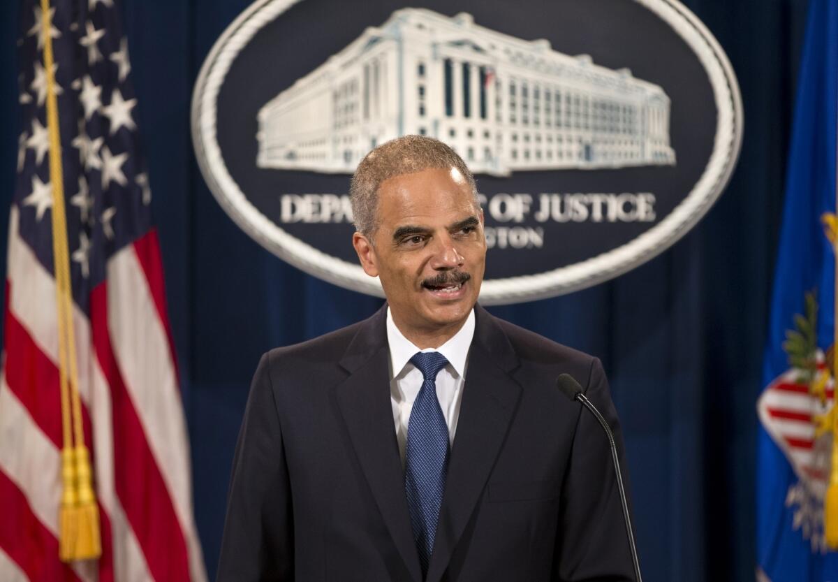 Atty. Gen. Eric Holder unveiled new guidelines to govern the Justice Department's behavior in cases involving news organizations.
