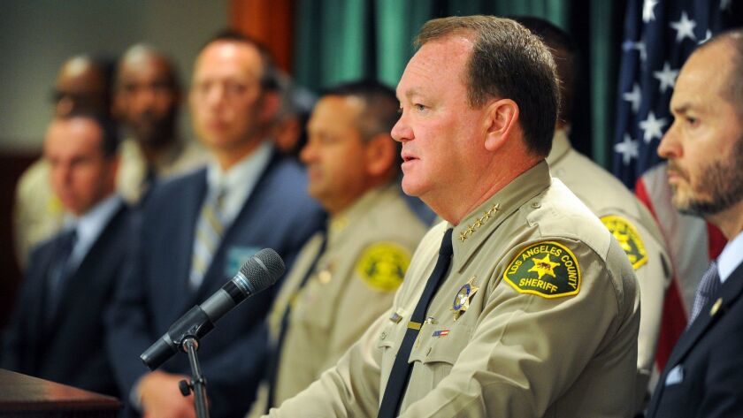 Los Angeles Sheriff Jim McDonnell discusses a task force — made up of L.A. police, sheriff's officials, prosecutors and the U.S. Marshals Service — focused on quelling gang violence in the Vermont Corridor. Thirty-eight people have been arrested in connection with the case.