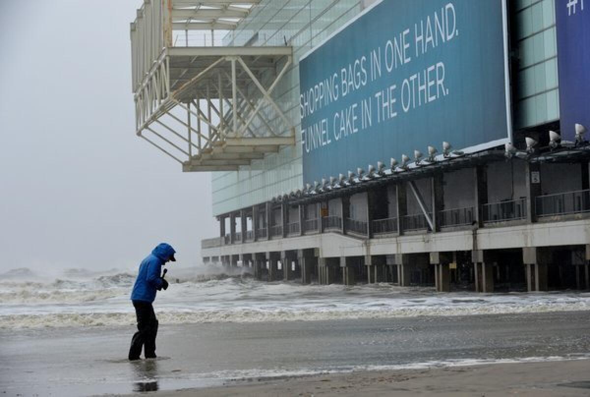 The Atlantic City boardwalk is deluged by Sandy. The so-called Frankenstorm is already affecting the Ivy League and is predicted to cause millions in economic damage.