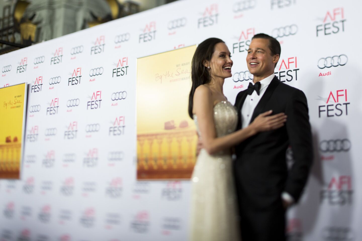 Angelina Jolie Pitt and Brad Pitt pose on the red carpet for the opening night premiere of their film "By the Sea" in Hollywood in November 2015.