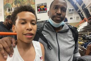 Freshman JD Wyatt and his father, Joe.