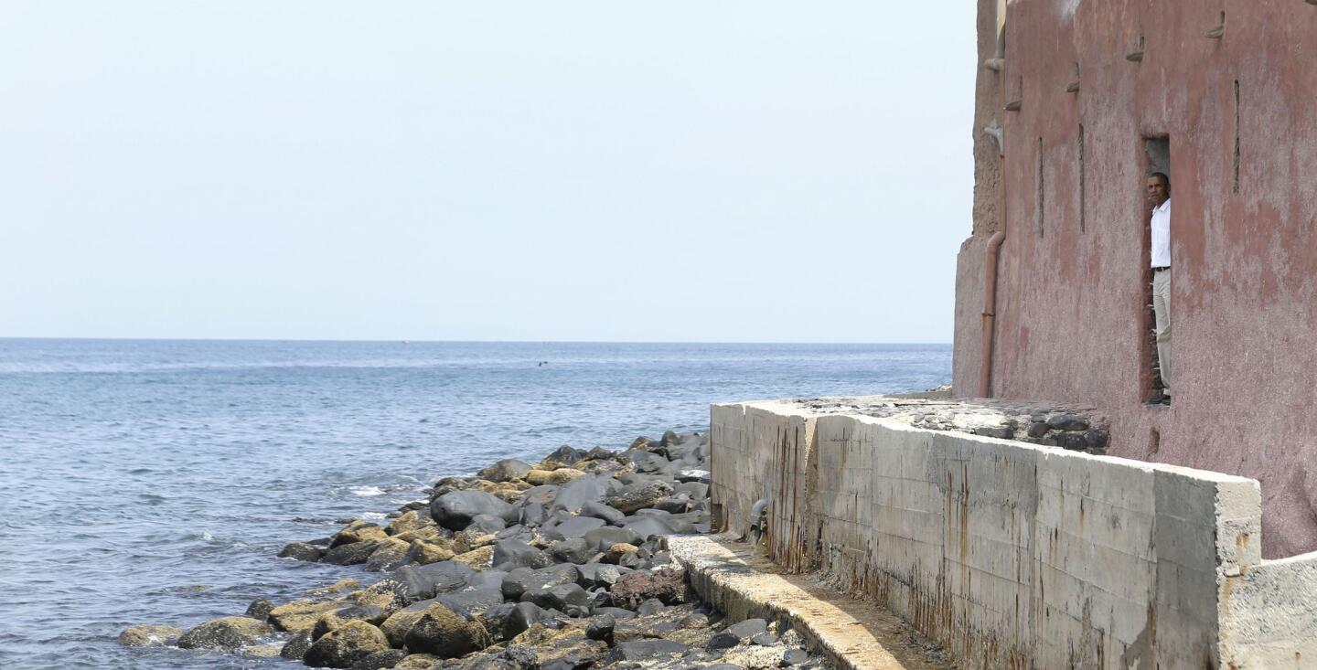 U.S. President Barack Obama is pictured at the door of no return as he visits the Maison Des Ecslaves on Goree Island in Senegal