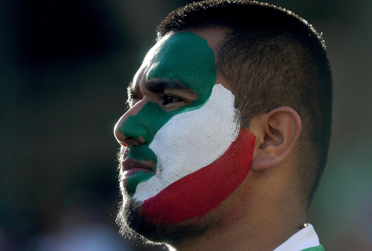 SANTA CLARA, CA - JUNE 18: A Fans of Mexico with his face painted with the countys colors looks on from the stands prior to the start of the game of the 2016 Copa America Centenario Quarterfinals match play between Mexico and Chile at Levi's Stadium on June 18, 2016 in Santa Clara, California. (Photo by Thearon W. Henderson/Getty Images) ** OUTS - ELSENT, FPG, CM - OUTS * NM, PH, VA if sourced by CT, LA or MoD **