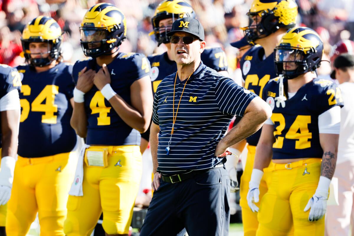 Michigan coach Jim Harbaugh stands on the sideline during the Rose Bowl on Jan. 1.