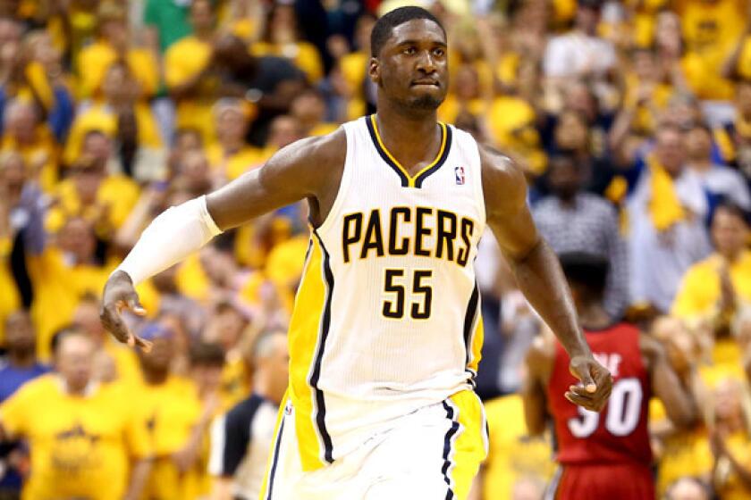 Pacers center Roy Hibbert celebrates after scoring against the Heat in Game 6 on Saturday night.