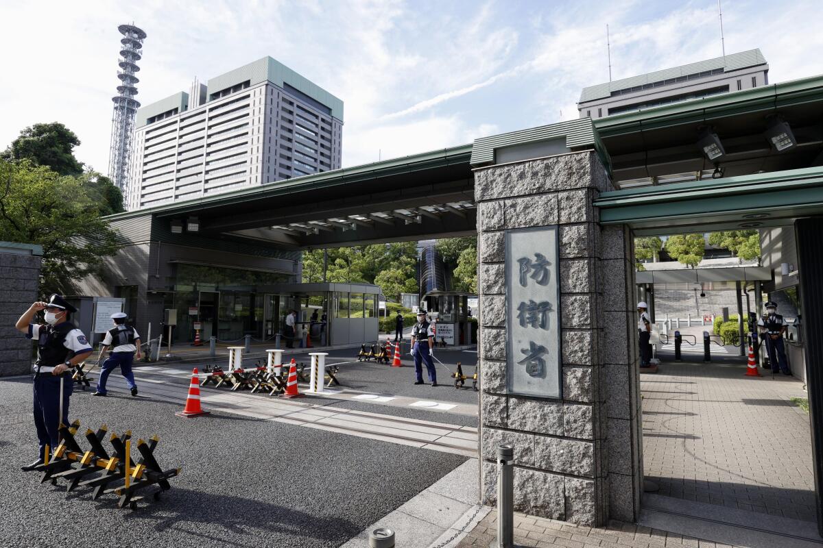 The exterior of Japan's defense ministry is seen in Tokyo, Aug. 19, 2021. Japan’s Defense Ministry said Sunday, Sept. 12, that it has detected a submarine believed to be Chinese along off a southern Japanese island, heightening Japan’s caution levels in the East China Sea already faced with China’s growing military activities.(Kenzaburo Fukuhara/Kyodo News via AP)