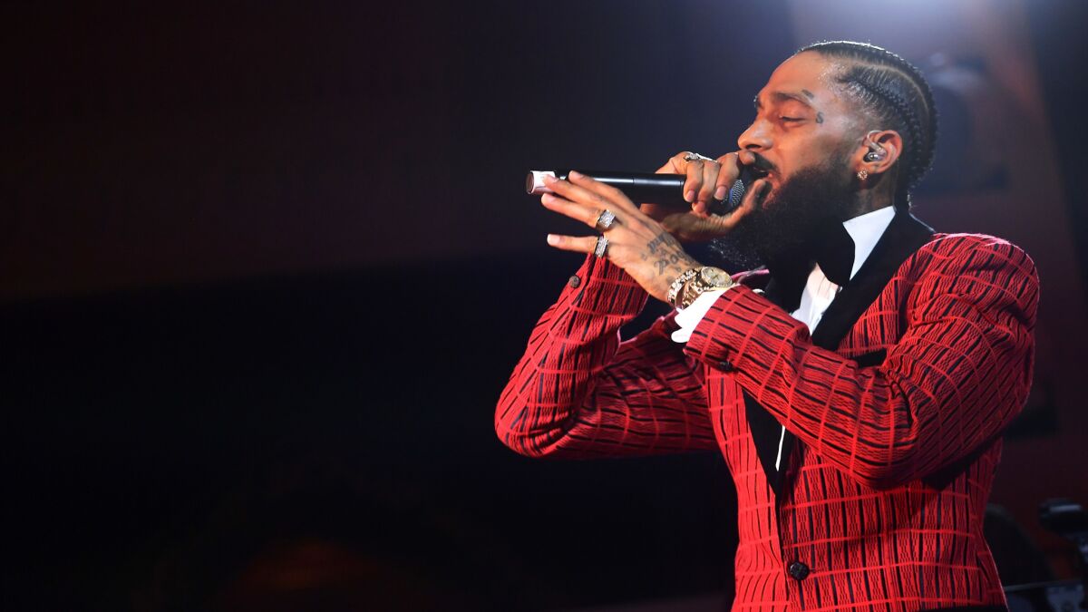 Nipsey Hussle performs onstage at the Warner Music Grammy Awards party at the NoMad Hotel on Feb. 7.