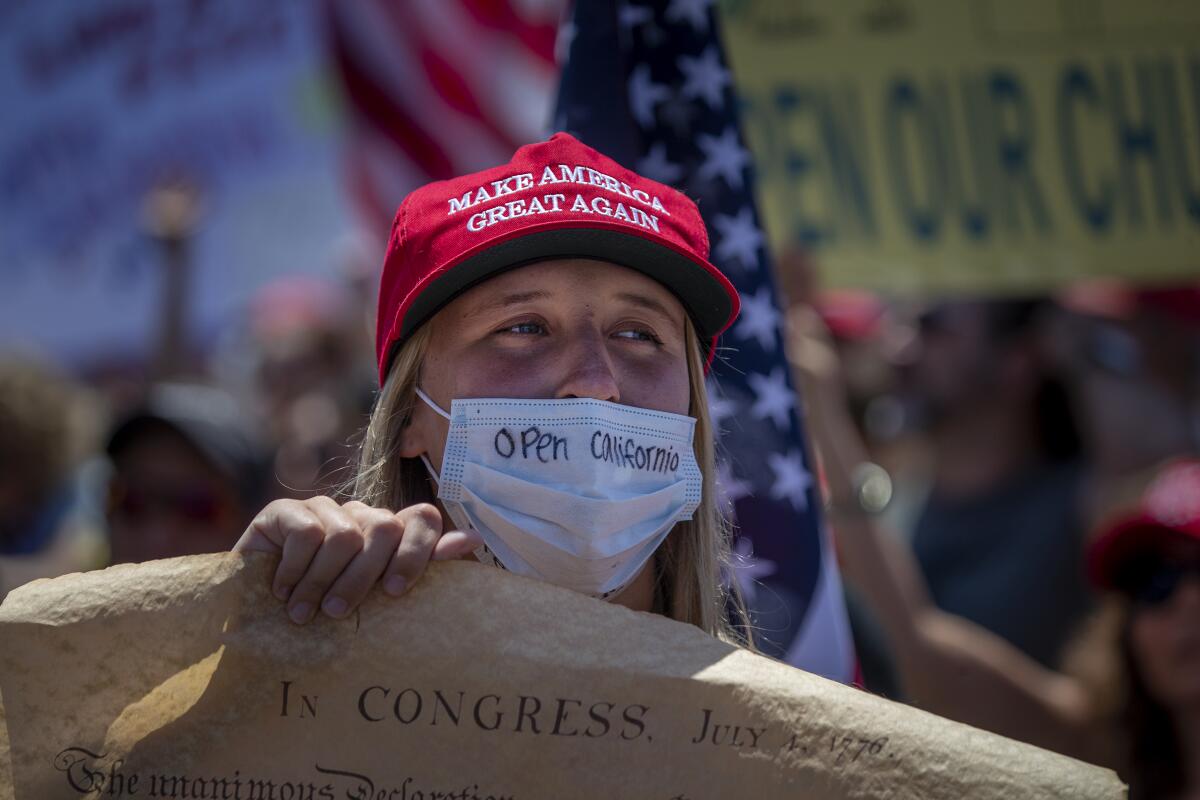 A protester in Huntington Beach