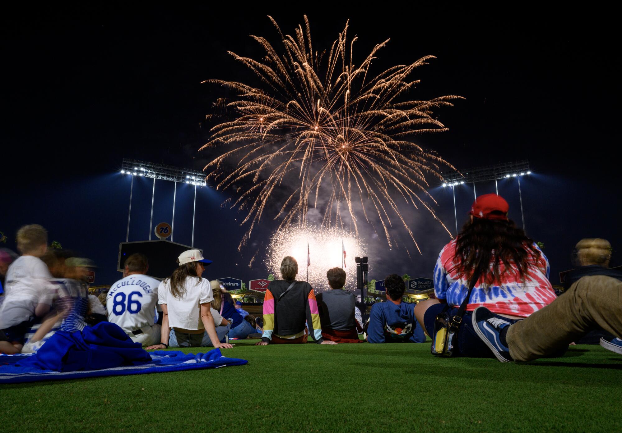Fans watch the Fourth of July fireworks show at Dodger Stadium following Thursday's game.