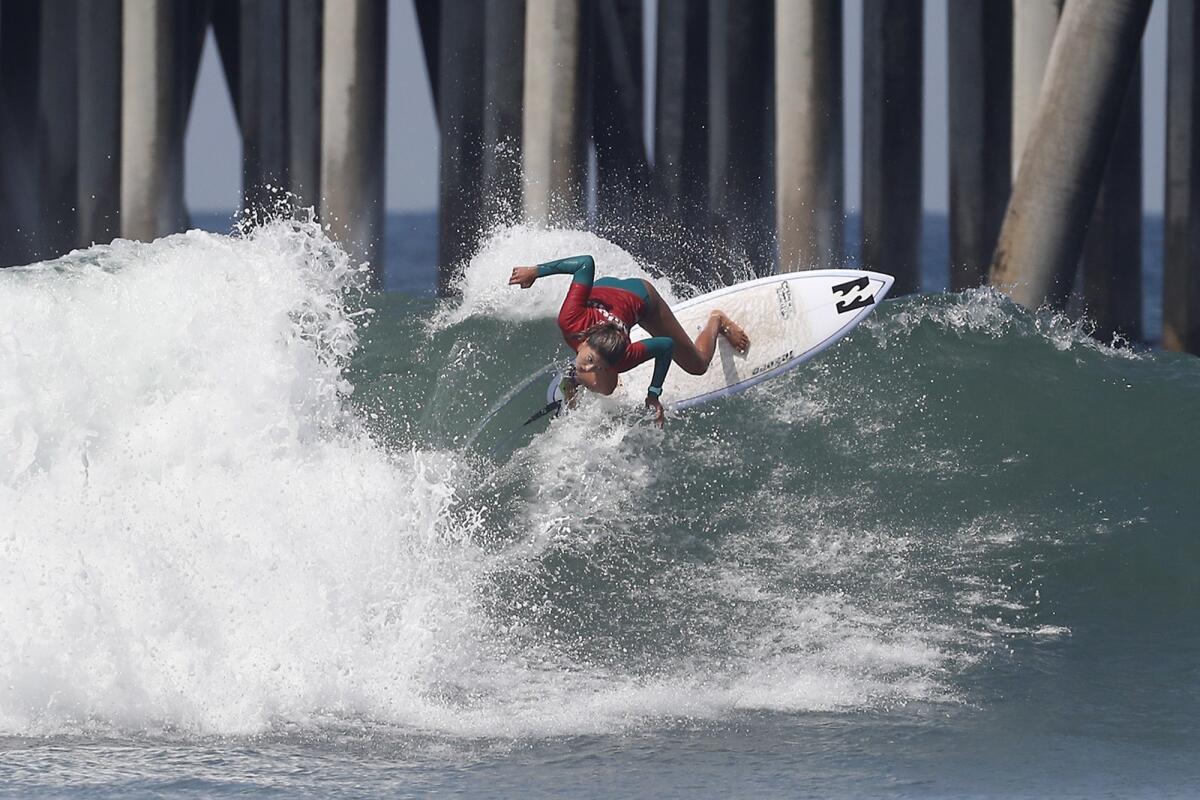 Luana Silva of Hawaii competes in the open women's final at the National Scholastic Surfing Assn. National Championships in Huntington Beach on Wednesday.