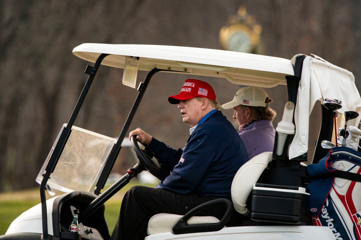 President Trump drives a golf cart at Trump National Golf Club in Sterling, Va., on Dec. 13.