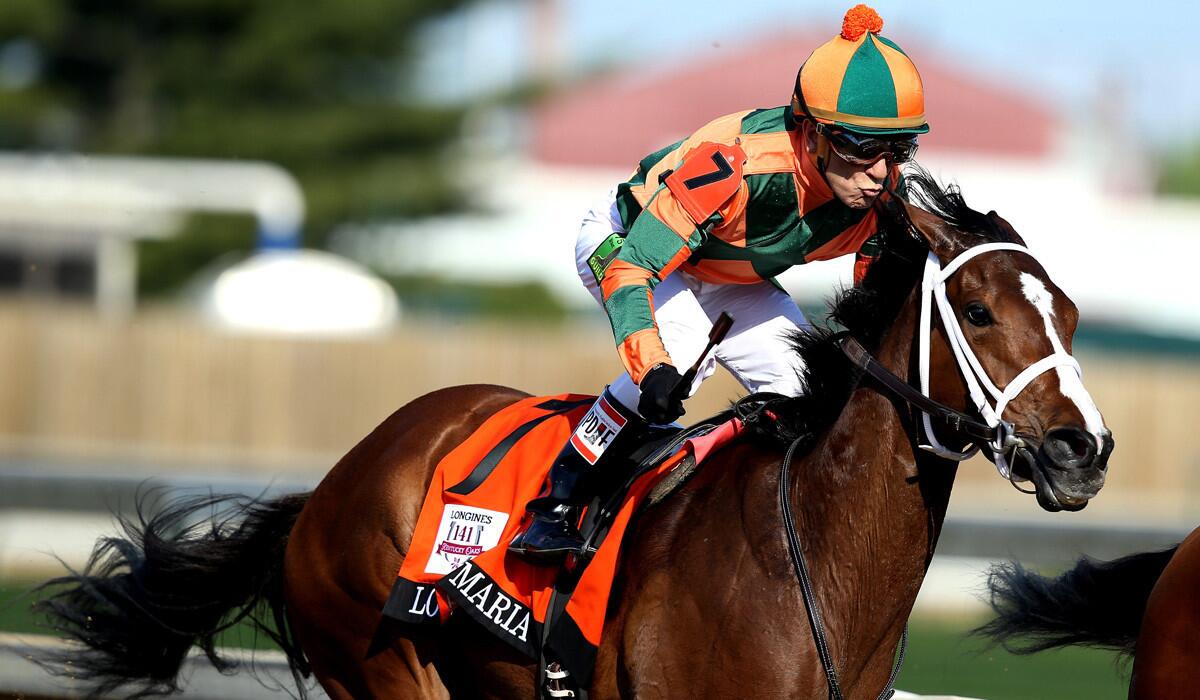 Lovely Maria rounds turn four during the 141st running of the Kentucky Oaks at Churchill Downs in Louisville, Kentucky on Friday.