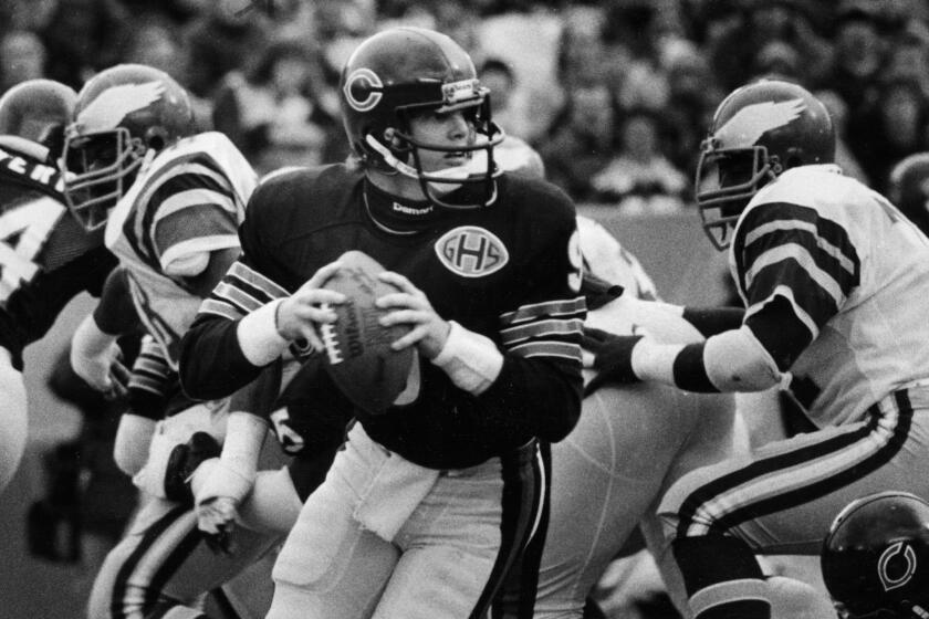 Bears quarterback Jim McMahon is set to throw in the first half of their game against the Eagles on Nov. 13, 1983. (Phil Mascione/Chicago Tribune) published on Nov. 21, 1983. Folder Description: McMahon, Jim Folder Extended Description: Football Action 1983 - 1984 Title: MCMAHON, JIM FOOTBALL ACTION 1983-84 Subject: MCMAHON, JIM