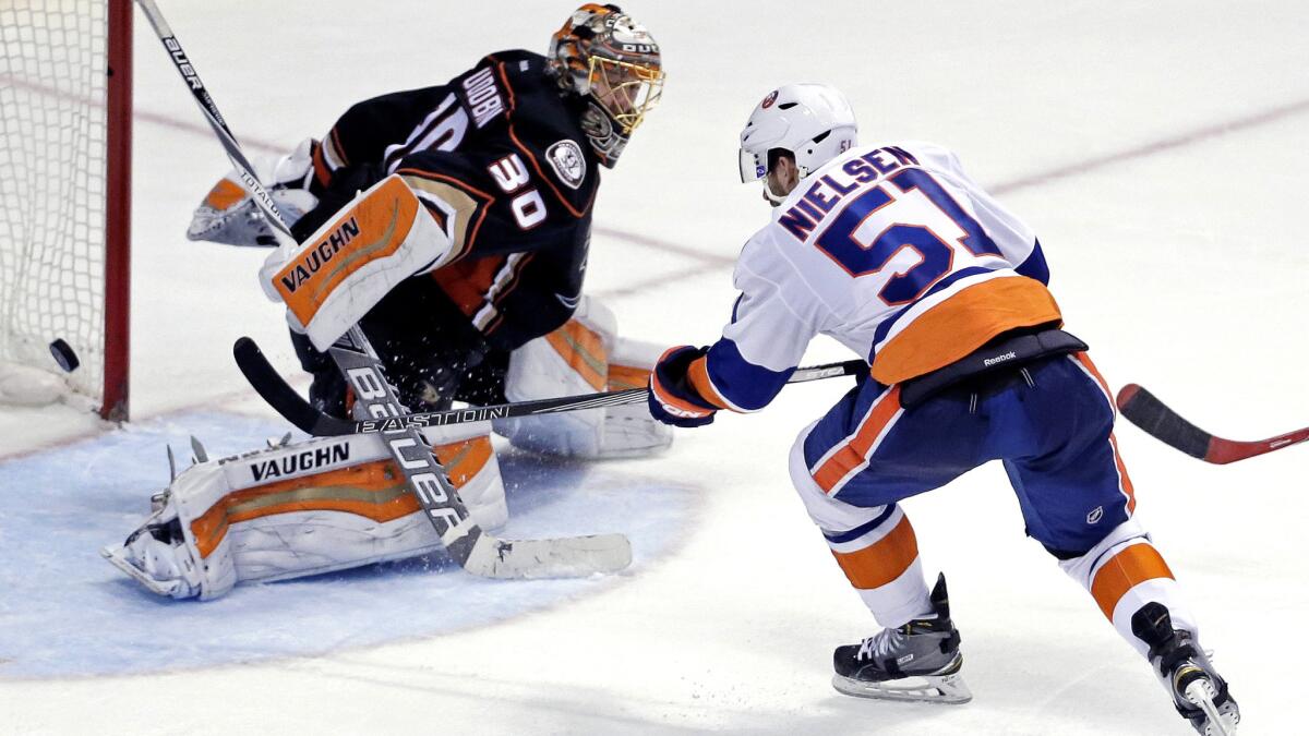 Islanders center Frans Nielsen scores against Ducks goalie Anton Khudobin in the third period Friday night.