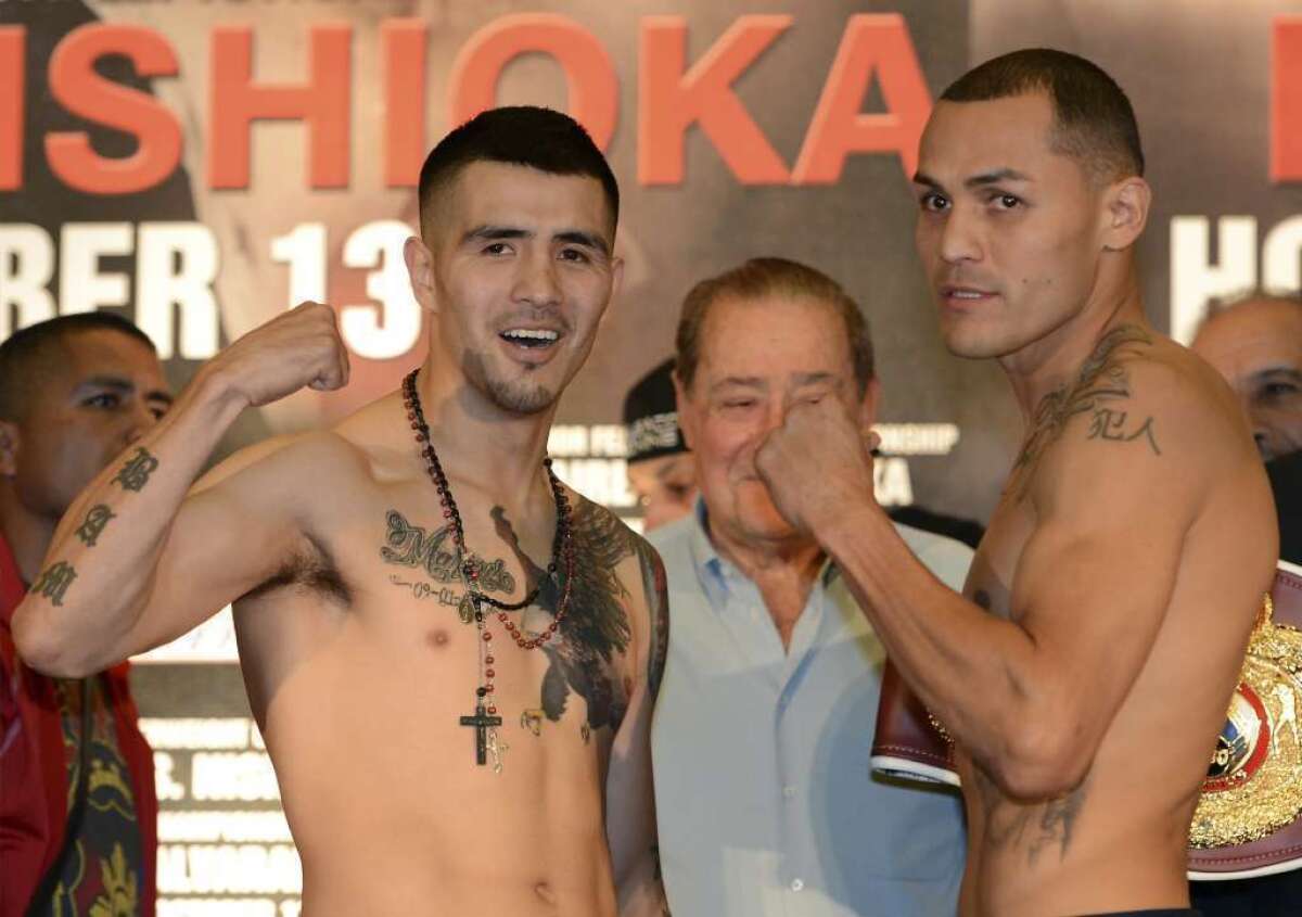 Brandon Rios, left, and Mike Alvarado pose during a weigh-in on Oct. 12, 2012. Rios handed Alvarado the only loss of his career in the ensuing bout, by technical knockout in the seventh round of an all-action battle.