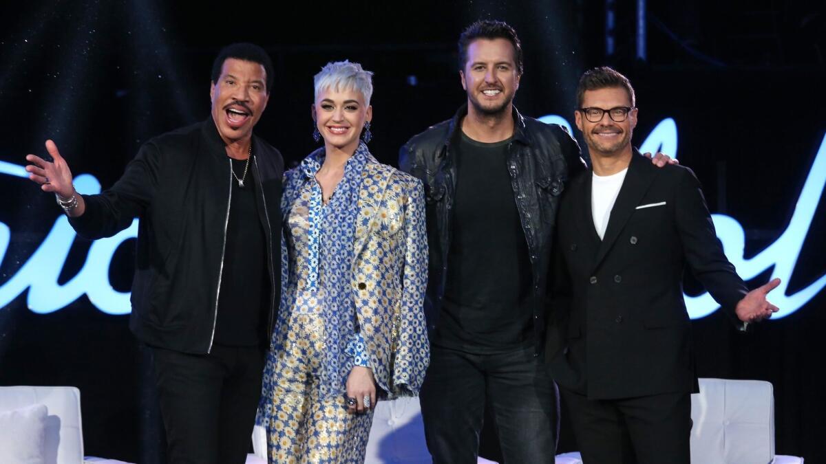 Lionel Richie, from left, Katy Perry and Luke Bryan are the new judges for ABC's "American Idol," along with host Ryan Seacrest.