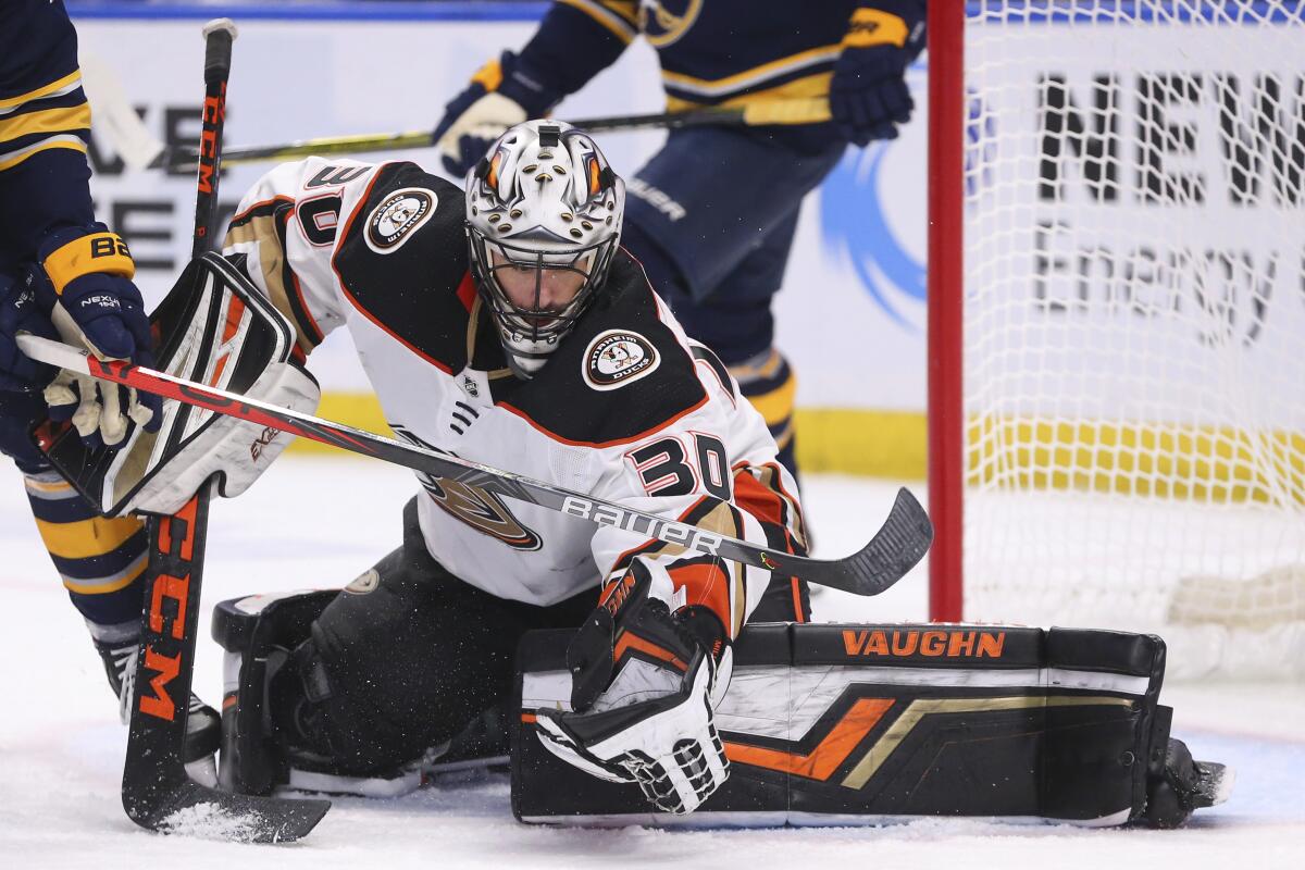 Ducks goalie Ryan Miller makes a glove save during the third period of the Ducks' 3-2 win Sunday over the Buffalo Sabres.