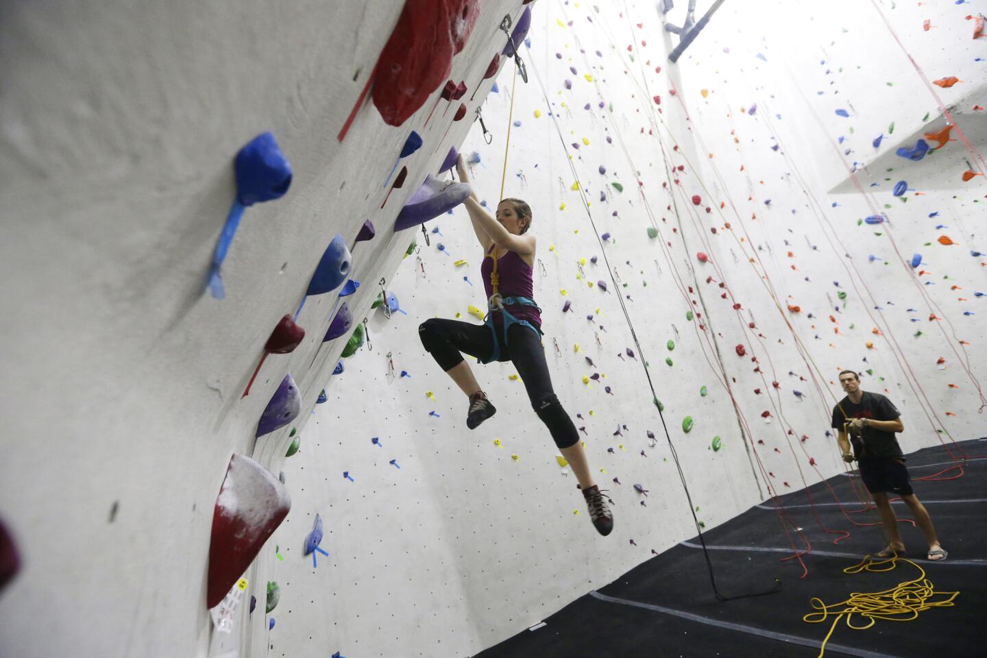 Alison Dillon and her brother Tom train in top-rope climbing.