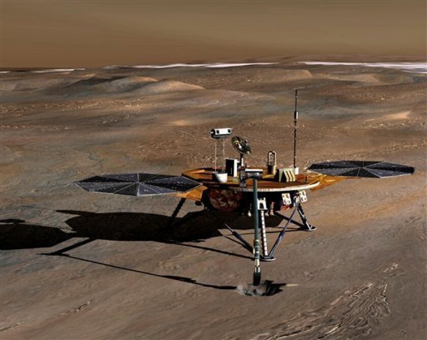 This artist's rendering provided by NASA shows the Phoenix Mars spacecraft. NASA said Monday, Nov. 10. 2008, that the Phoenix Mars mission has ended. The lander has been digging trenches and conducting science experiments since May, to study whether the environment on Mars could support primitive life. (AP Photo/NASA)