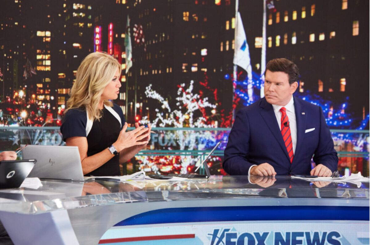 Fox News presenters Martha MacCallum and Bret Baier.