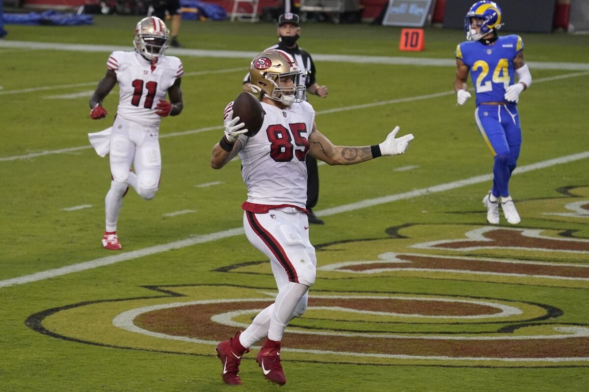 San Francisco 49ers tight end George Kittle (85) celebrates after scoring a touchdown against the Los Angeles Rams.