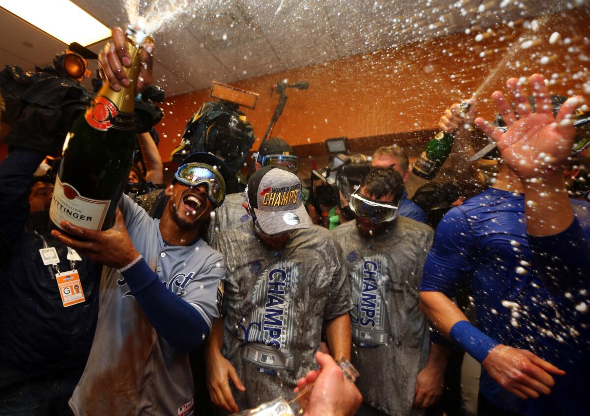 The Kansas City Royals celebrate in the clubhouse after defeating the Mets in Game 5 to win the 2015 World Series.