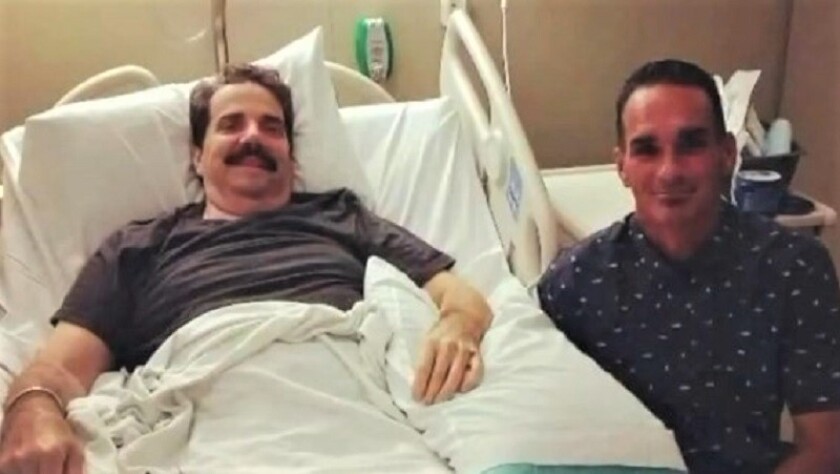 Tom Sovilla, left, and Jack Keith became friends after Sovilla was seriously injured in May when struck by Keith's vehicle on Pacific Coast Highway in Huntington Beach.
