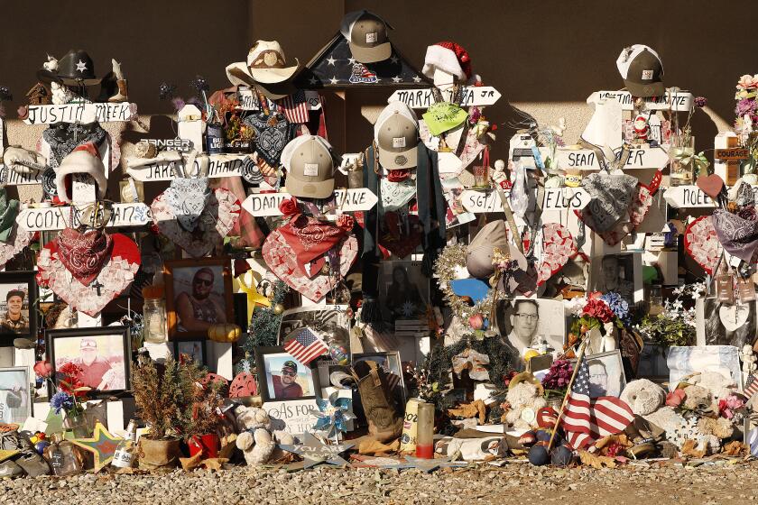 THOUSAND OAKS, CA - NOVEMBER 5, 2019 A memorial to the 12 victims of the Borderline Bar and Grill mass shooting in Thousand Oaks continues to stand as people come to pay respects in front of the country-western bar frequented by college students at the one year anniversary of the shooting on Nov 7, 2018. (Al Seib / Los Angeles Times)