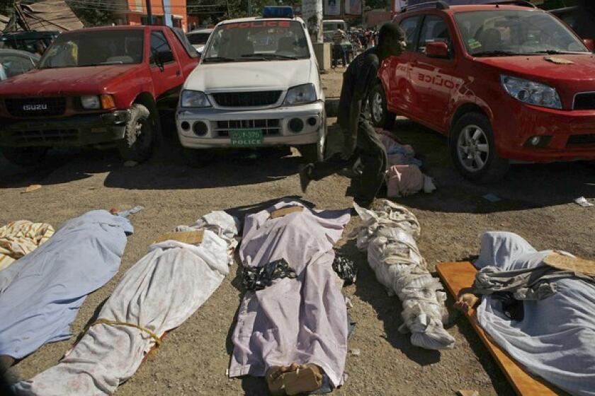 Bodies are left in the street in Port-au-Prince, Haiti, for lack of transportation or government services.