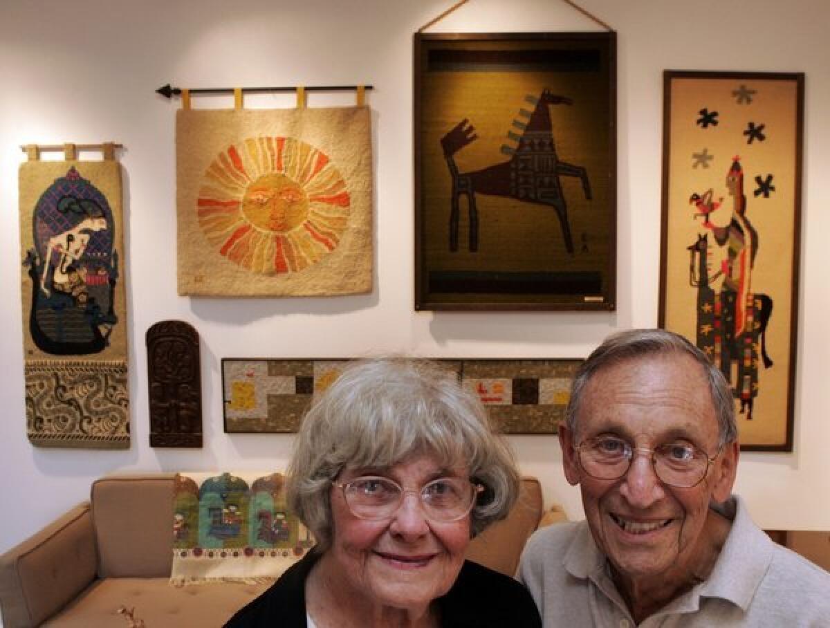Evelyn Ackerman -- midcentury mosaic artist, textile designer and creator of works in ceramics, enamel and wood -- is shown with husband Jerry in this 2005 photo at Reform Gallery. More recently, her designs have been finding an audience among a new generation of curators and collectors drawn to the spirit that infuses her work, no matter the medium.
