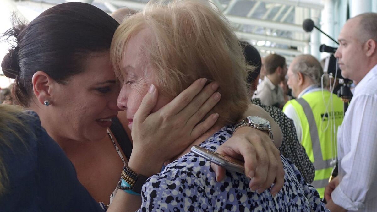 Caribbean evacuees greet their relatives on at Port Everglades in Fort Lauderdale.