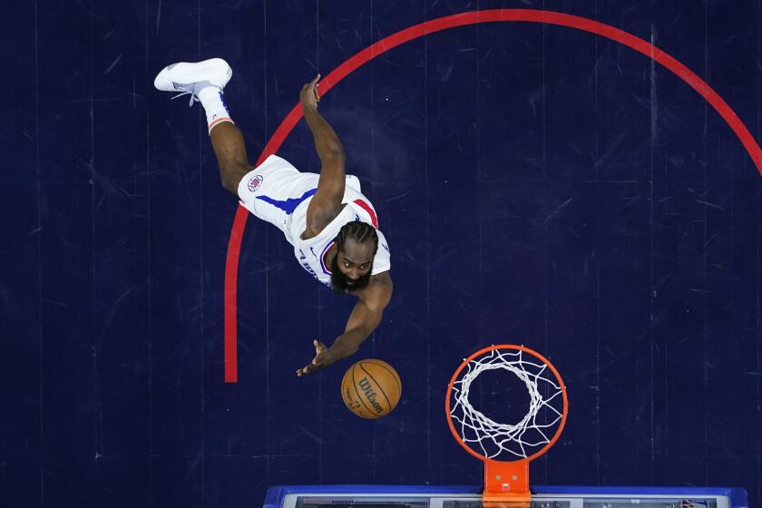 James Harden goes up for a shot during the first half