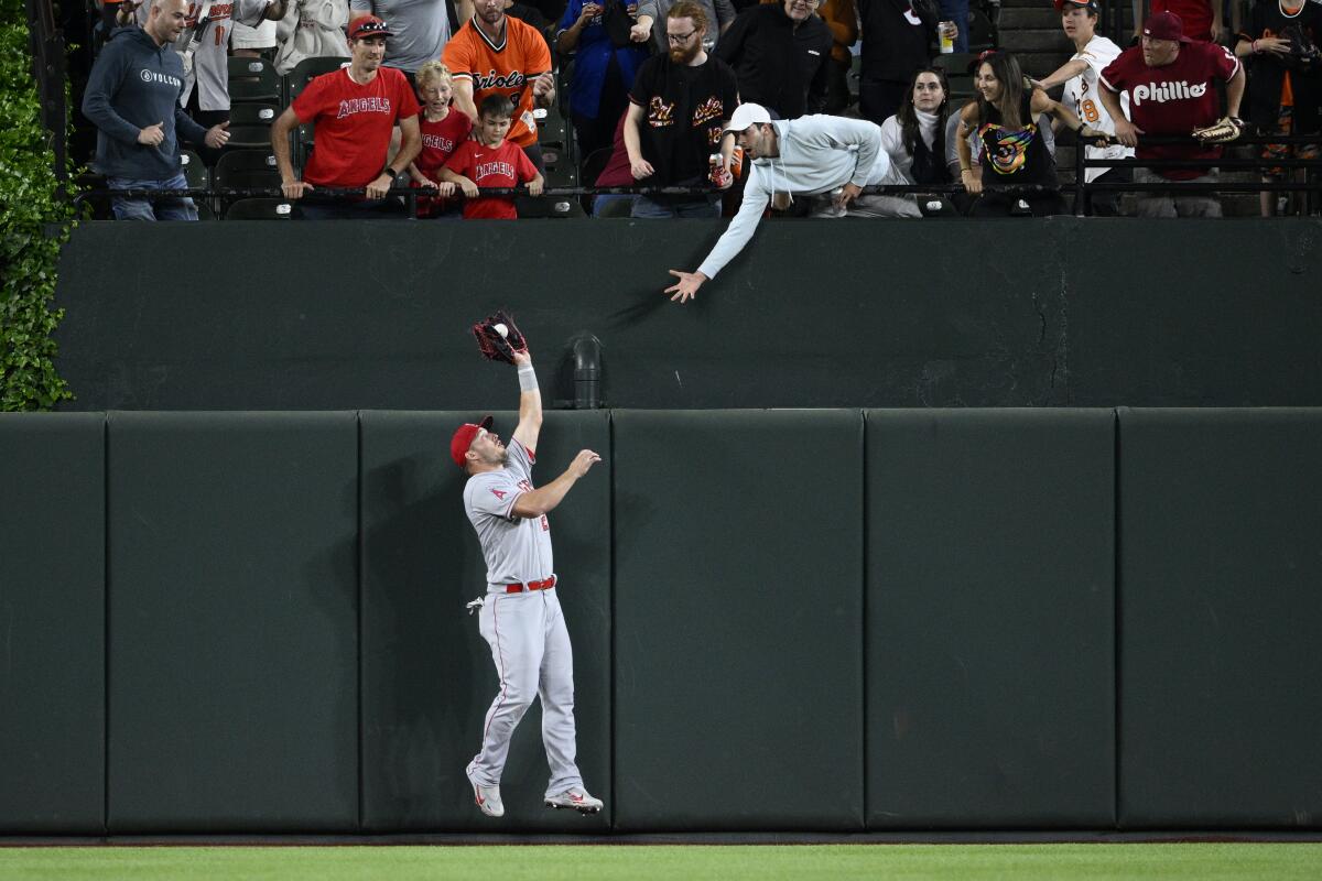 Angels center fielder Mike Trout makes a leaping catch on a fly ball hit by the Orioles' Austin Hays.
