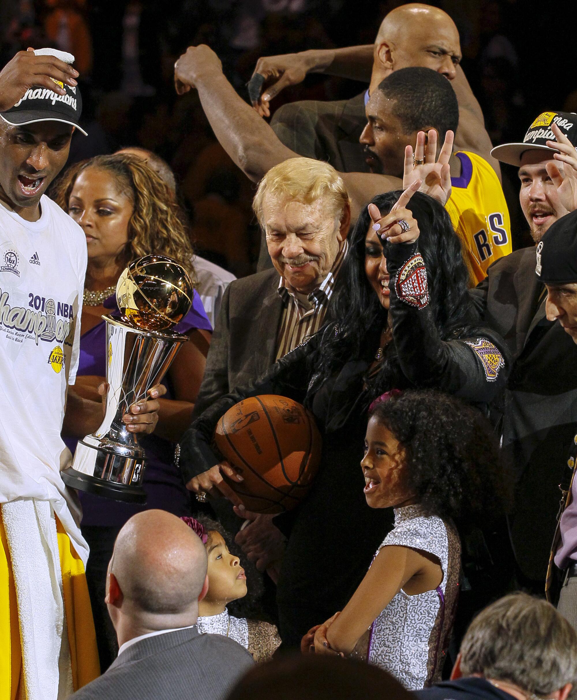 Owner Jerry Buss joins Kobe Bryant’s family and Lakers teammates as they celebrate winning the 2010 NBA championship.
