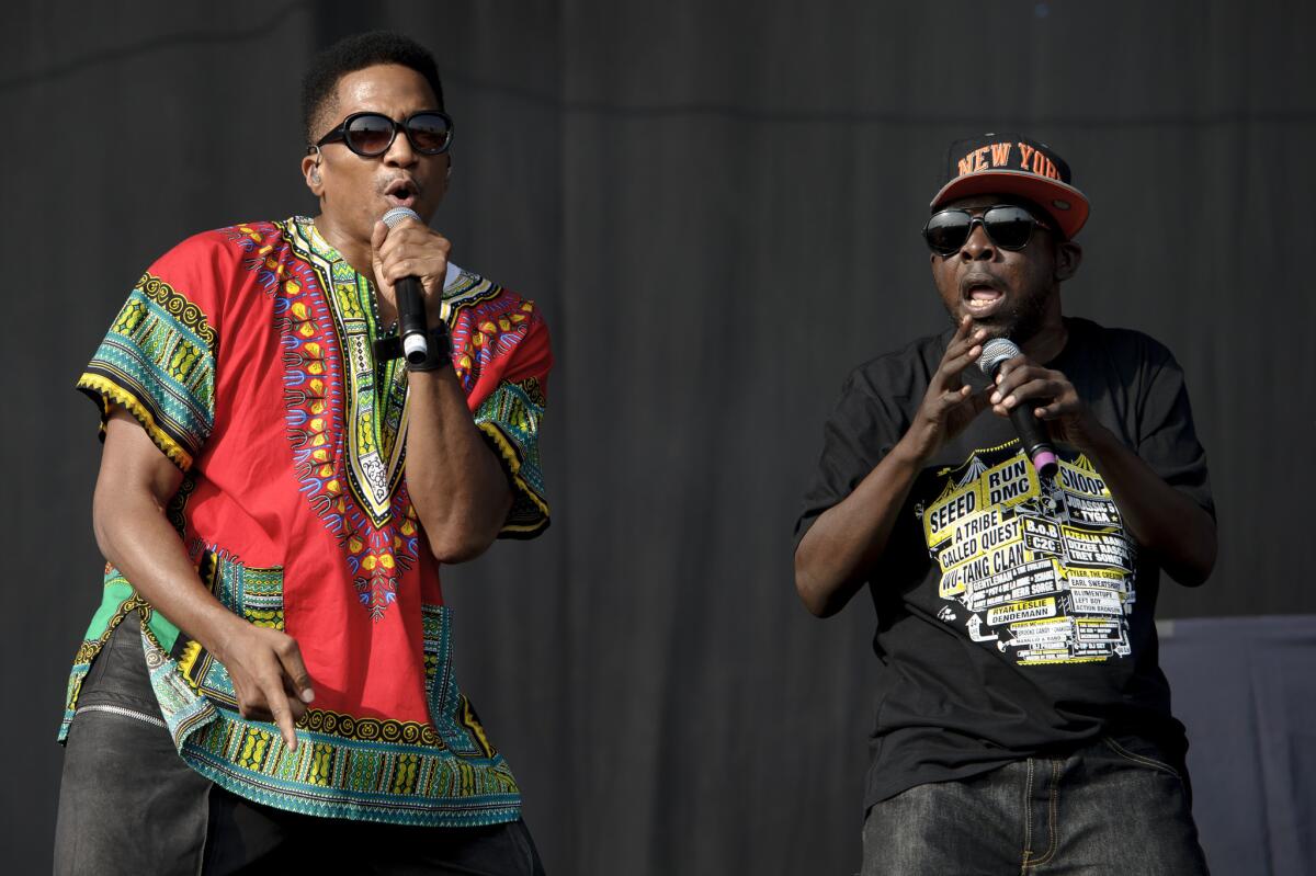 Q-Tip, left, and Phife Dawg from A Tribe Called Quest perform during the Wireless Festival at the Queen Elizabeth Olympic Park in London. (Jonathan Short / Associated Press)