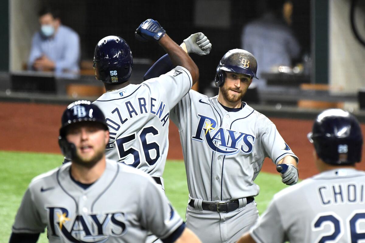 Brandon Lowe celebrates his home run against the Dodgers in Game 2 of the World Series.