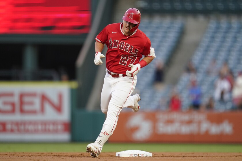 Angels' Mike Trout runs the bases after hitting a home run.