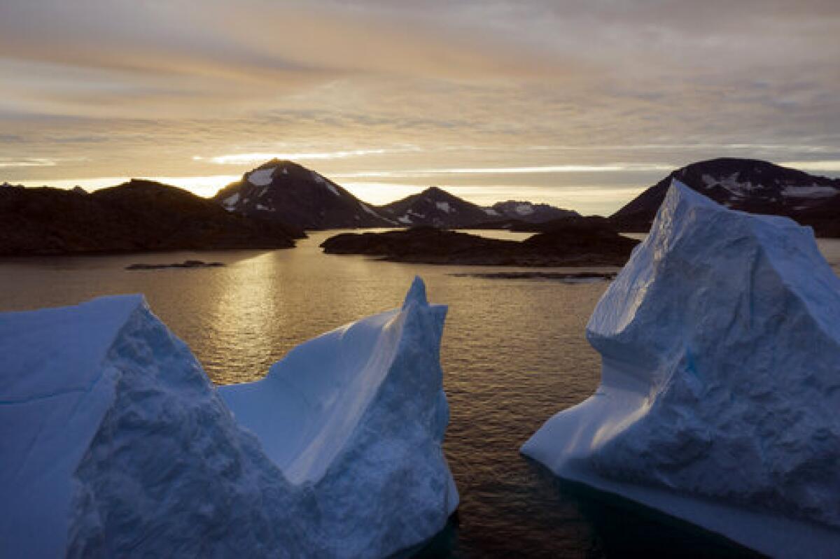 This 2019 file photo shows an aerial view of large Icebergs floating in Greenland. 
