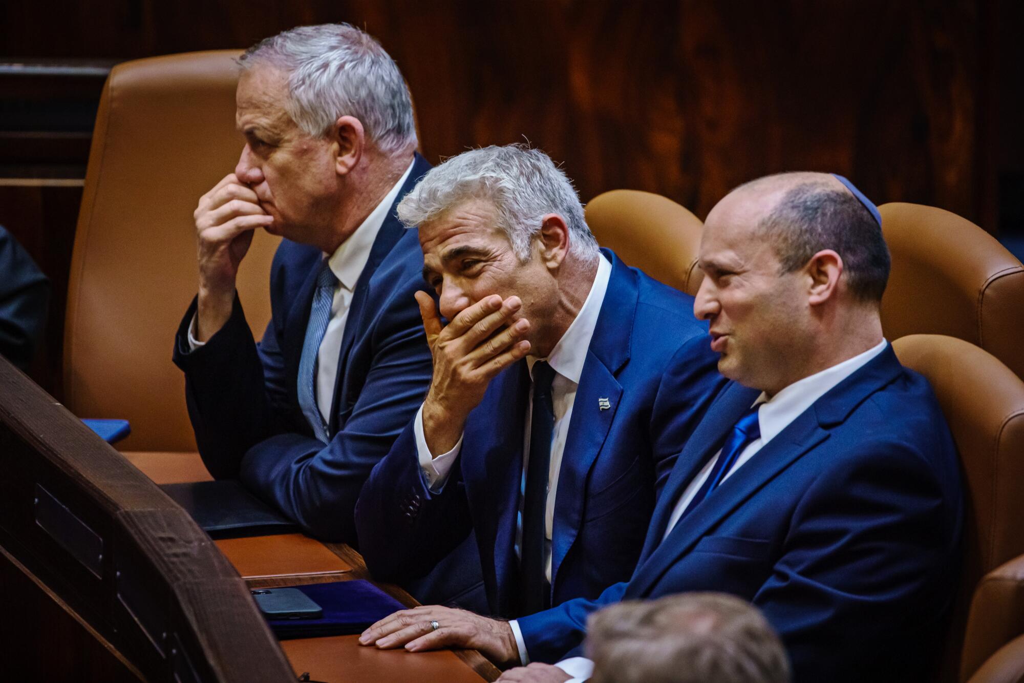 Deputy Prime Minister Benny Gantz, Foreign Affairs Minister Yair Lapid and Prime Minister Naftali Bennett.