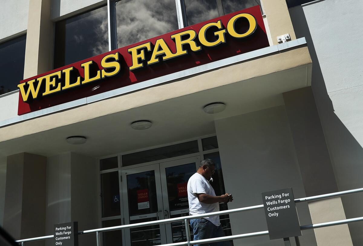 Aggressive sales tactics by Wells Fargo & Co. employees led to a $185-million settlement package with federal and state regulators last week. Above, a branch in Miami.