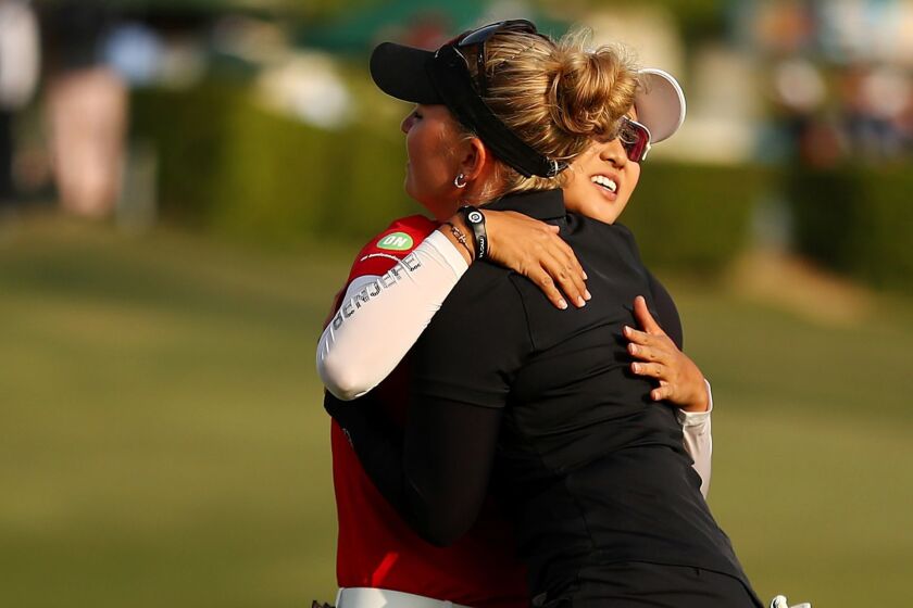 LOS ANGELES, CALIFORNIA - APRIL 27: Minjee Lee of Australia and Nanna Koerstz Madsen of Denmark hug after the completion of round three of the HUGEL-AIR PREMIA LA Open at Wilshire Country Club on April 27, 2019 in Los Angeles, California. (Photo by Yong Teck Lim/Getty Images) ** OUTS - ELSENT, FPG, CM - OUTS * NM, PH, VA if sourced by CT, LA or MoD **