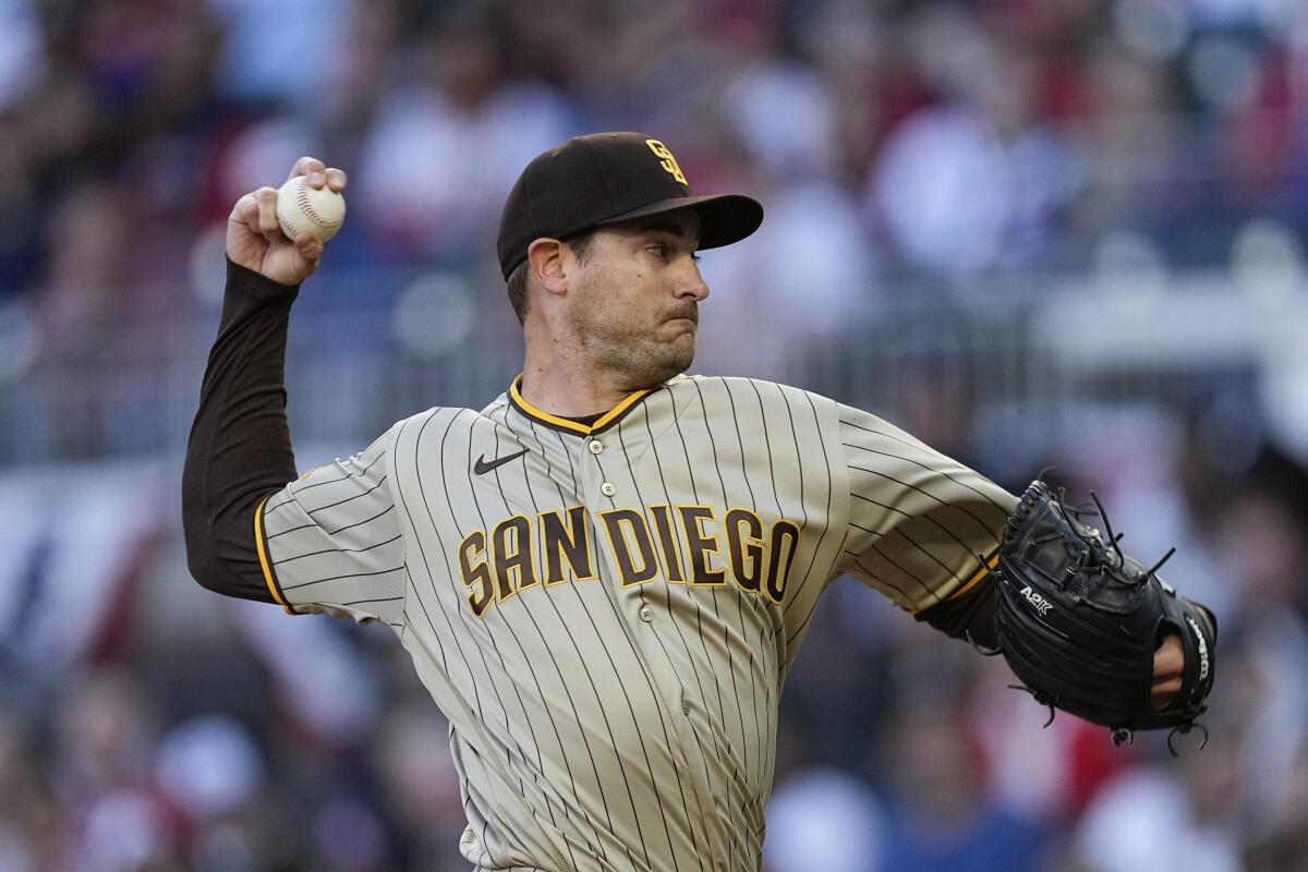 FILE - San Diego Padres starting pitcher Joe Musgrove works