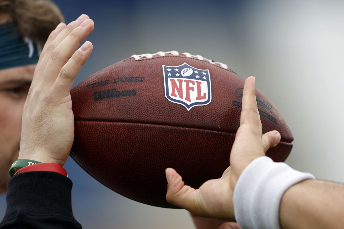 Seniors from NCAA colleges run through drills to increase their status for the NFL Draft during practice for the Senior Bowl NCAA college football game Wednesday, Feb. 1, 2023, in Mobile, Ala.. (AP Photo/Butch Dill)