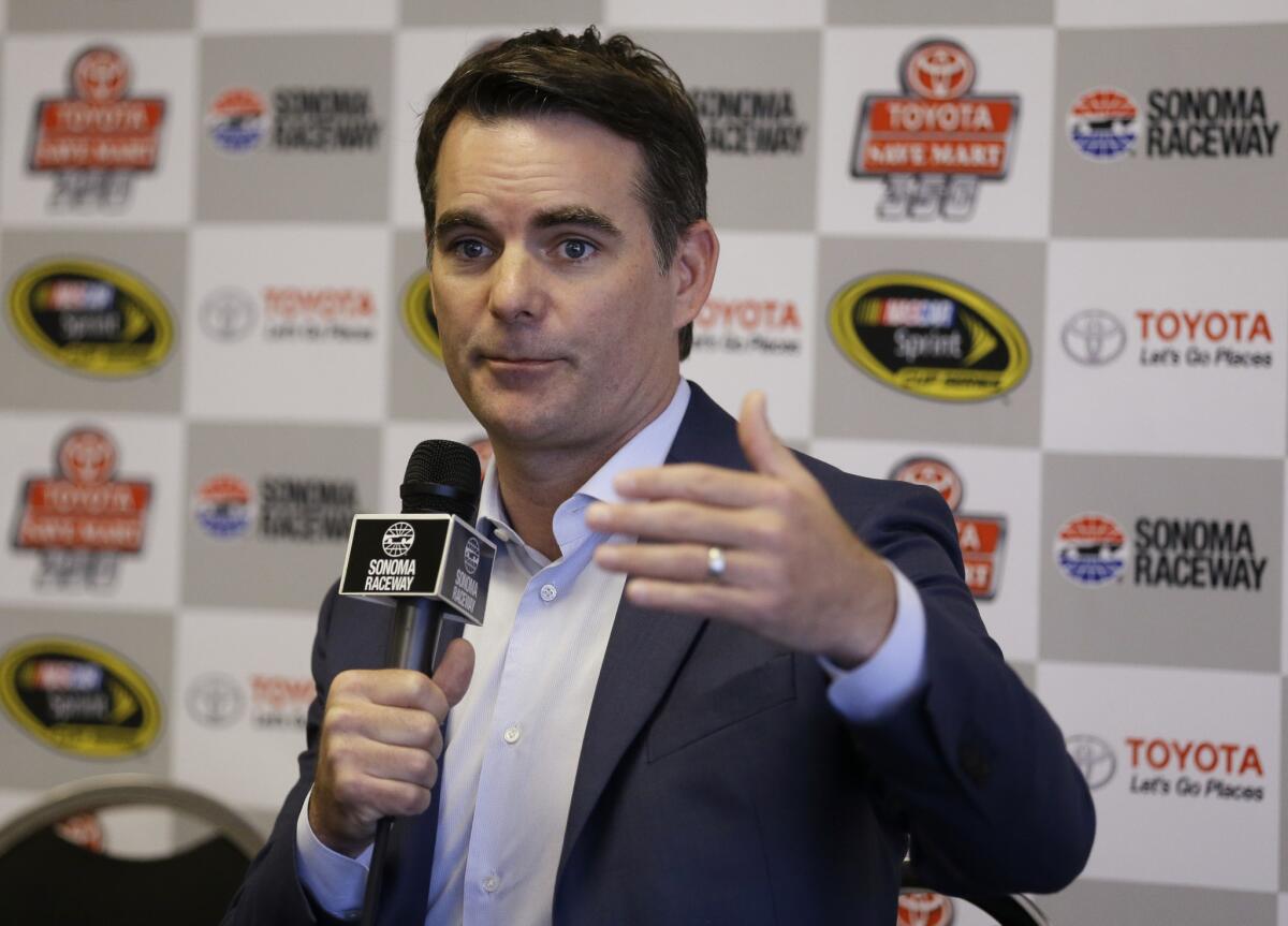 Former NASCAR Spring Cup Series driver Jeff Gordon gestures during a news conference prior to a race in Sonoma, Calif.